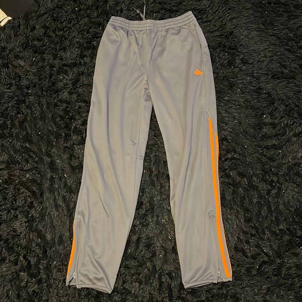 Boys size 18 pants, fits mens size XS grey adidas pants. With orange accents
